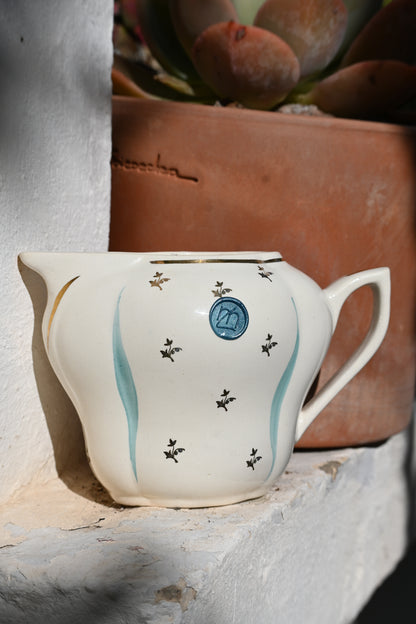 Pot à lait bleu doré